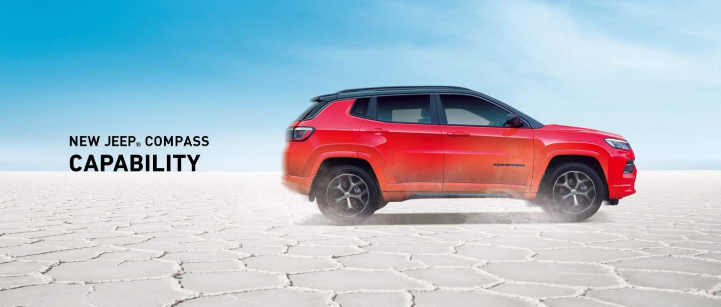 https://www.jeep-india.com/content/dam/cross-regional/apac/jeep/en_in/allnewjeepcompass7thjan/new-compass-price-reveal-23Jan/CAPABILITY-1550x661-DESKTOP.jpg.img.1440.jpg